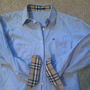 Women’s Burberry sky blue cotton button down with plaid collar and cuffs.